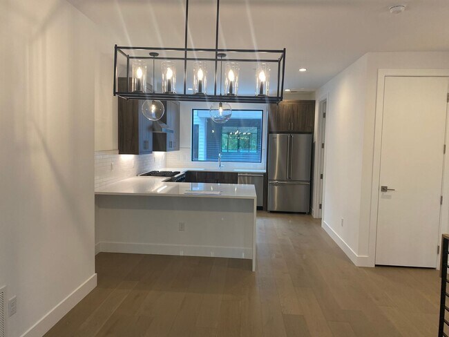 Building Photo - Upscale Modern Townhome Ready for you to Call Home!