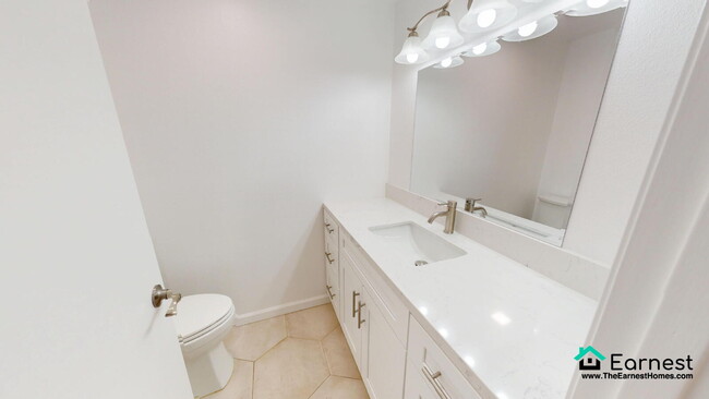 Foto del edificio - Spacious & Modern 3-Bedroom Condo in Prime...