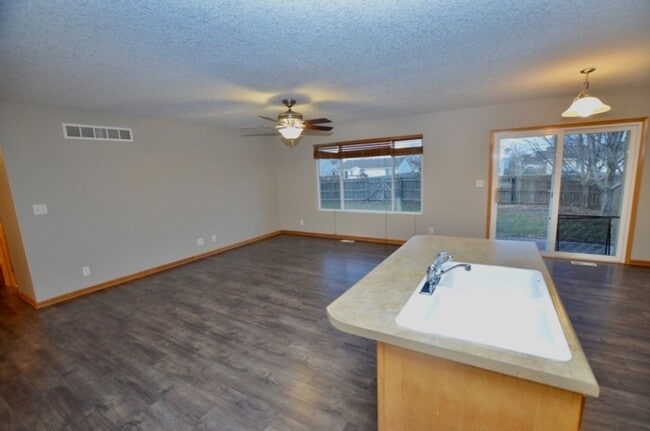 Building Photo - Open Layout Waukee Ranch