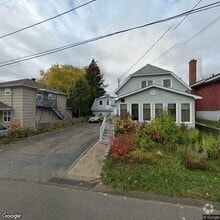 Building Photo - 58-45e 45e Av