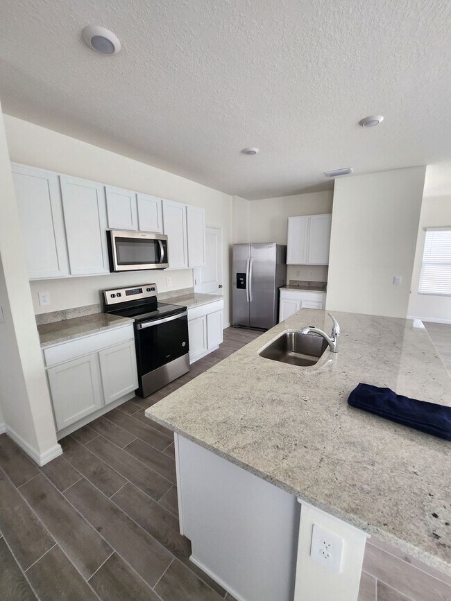 Building Photo - New Construction at Oaks Preserve on Archer !