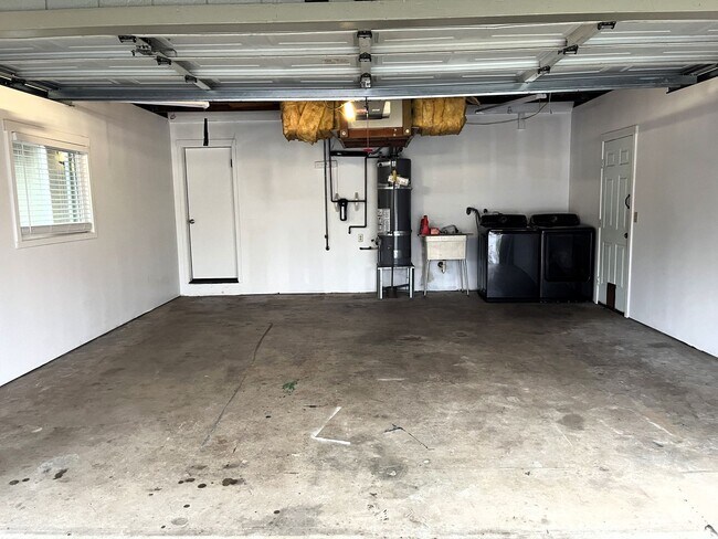 Building Photo - Newley updated 3-bedroom home features fen...