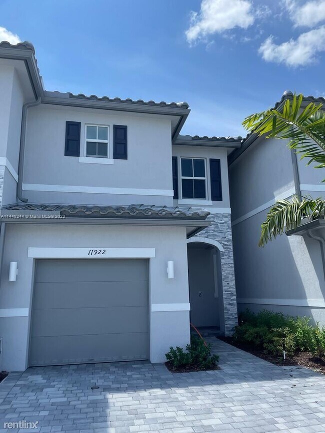 Foto del edificio - 3 br, 2.5 bath House - 11922 NW 47th Mnr #...
