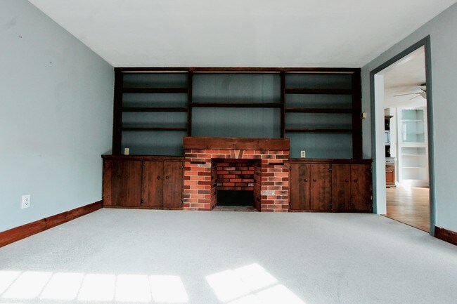 living room with fire place - 82 Flint St