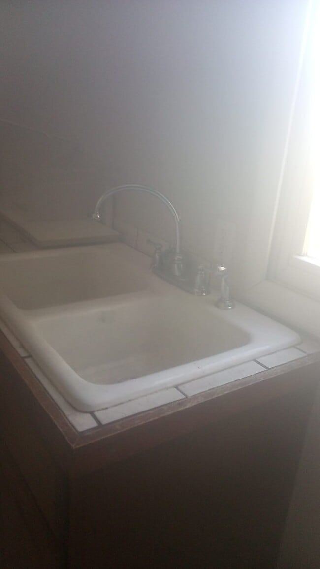 tiled countertop with arch tap - 709 E Brady St