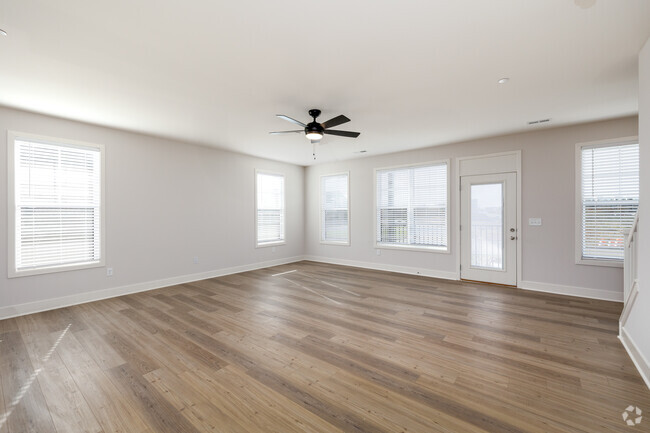 3BD, 2.5BA - 1,590SF - Living Room - The Avery