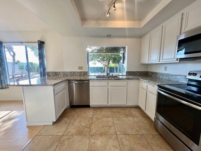 Building Photo - *MOVE IN SPECIAL* Spacious 4BD/2.5BTH Hous...