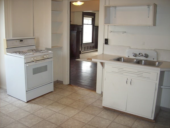 Building Photo - Vintage home on bus line with detached garage