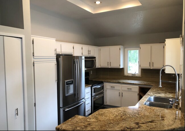 large kitchen, SS appliances; new cabinets; granite counters with backsplash - 97 Corsica Dr