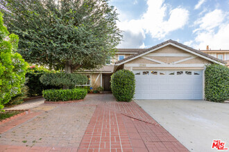 Building Photo - 7701 Comanche Ave