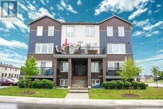 Building Photo - 102-102 Chakra St