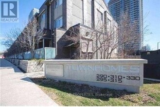 Building Photo - 315 Village Green Square