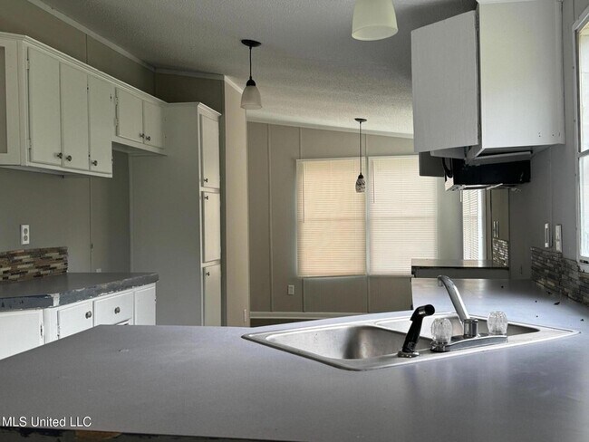 Foto del edificio - 5575 Robin Wood Rd