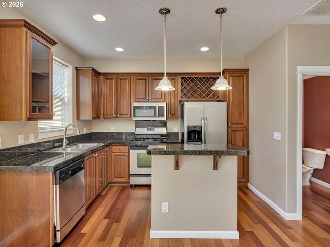 Building Photo - Spacious Living in a Modern Townhome