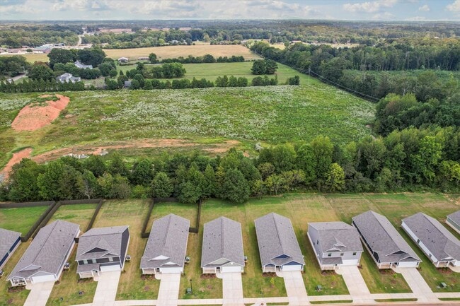 Building Photo - New 3BR Home in Whispering Woods – Modern ...