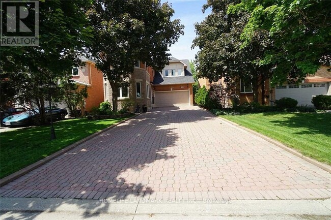 Building Photo - 4887 Natkarni Crescent