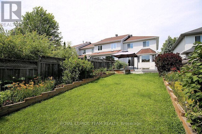 Photo du bâtiment - 119 Blackdome Crescent