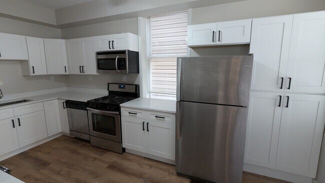 Kitchen with new cabinets and countertops - 1540 N Paulina St