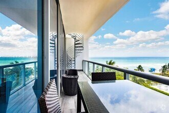 Building Photo - 6799 Collins Ave