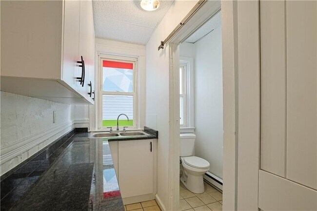 Foto del edificio - 56 Tell St