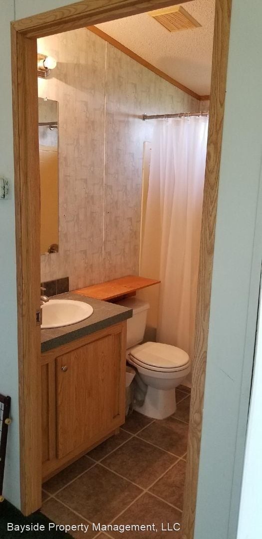 Building Photo - Manufactured home offers privacy and comfort sitting on a 1 acre property with mountain views in ...