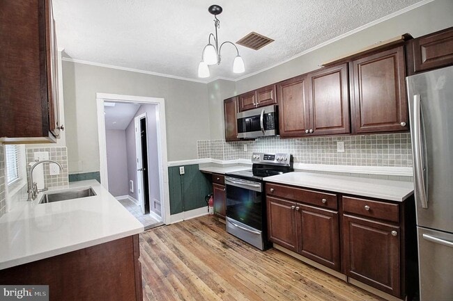 Foto del edificio - 213 E 6th St