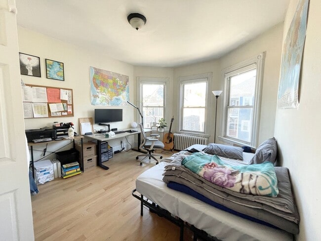 Building Photo - Modern 4-Bedroom on Sachem St — In-Unit Laundry • Updated Kitchen • Prime Mission Hill