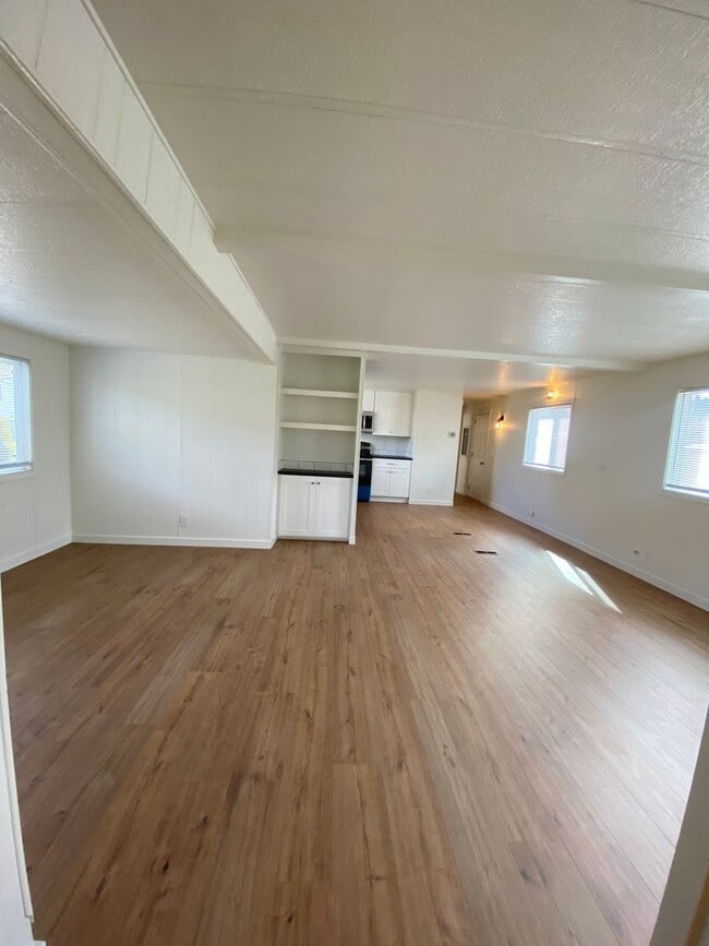 Building Photo - Beautifully just Remodeled-Spacious 3 bedrooms, 2 full baths mobile home with fenced yard. storag...