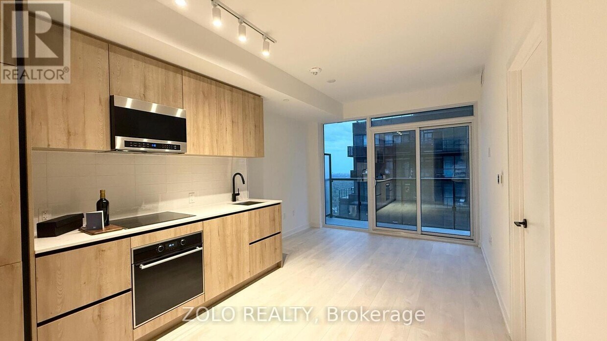 Photo principale - 117-3117 Broadway Ave
