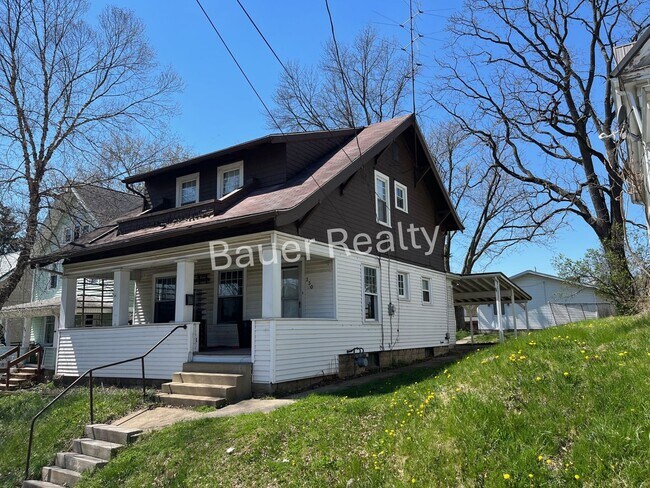 Building Photo - Three bedrooms, one and a half baths