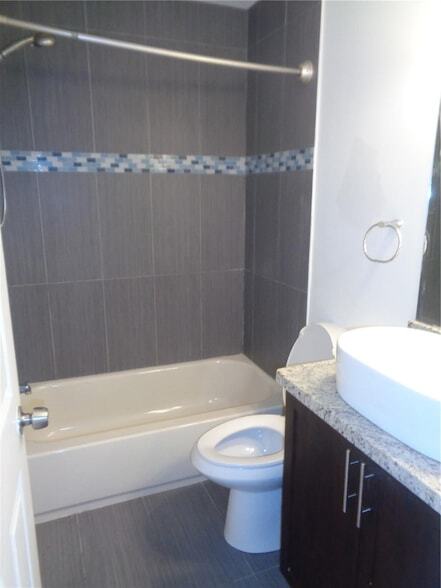 Photo - 10939 W Broward Blvd Townhome