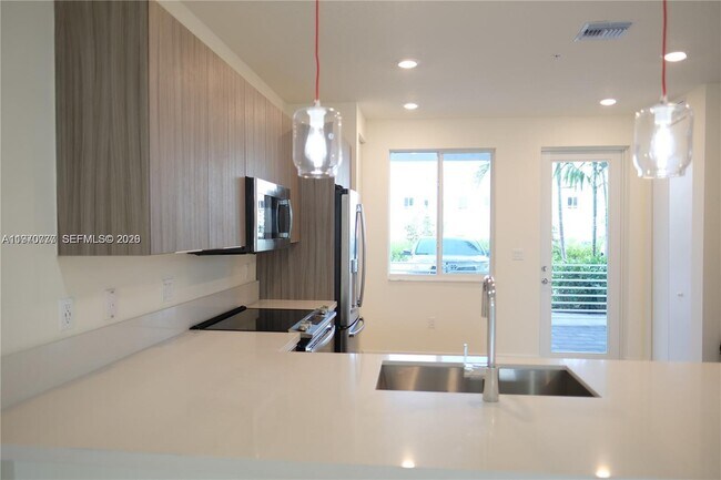 Foto del edificio - 6416 NW 102nd Ct