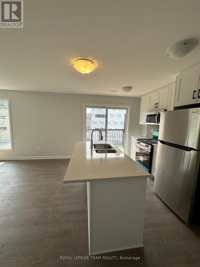 Photo du bâtiment - 1421 CREEKWAY Pvt