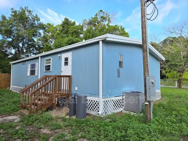 Building Photo - 8628 Adonis Rd