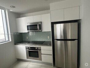 Building Photo - 1050 Brickell Ave