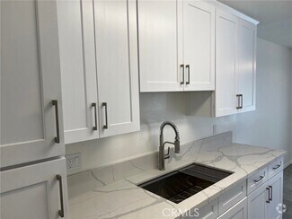 Building Photo - 7039 Remmet Ave