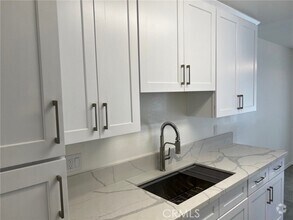 Building Photo - 7039 Remmet Ave