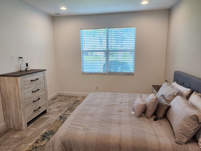 Building Photo - 2 BR w/ den  2 BA 2 CG villa in the the PG...