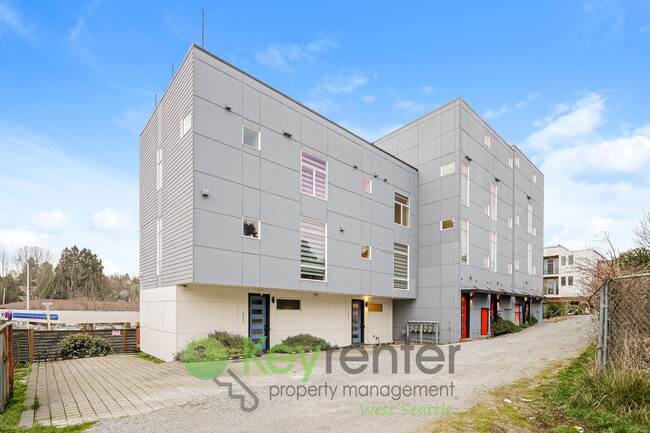 Foto del edificio - Rooftop Living with Open Concept Design and Parking Included