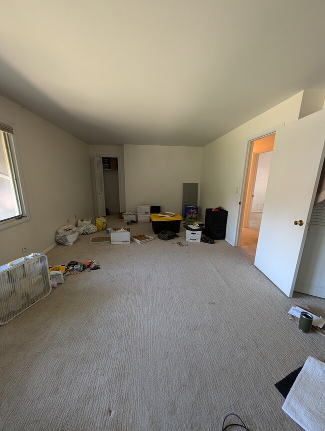 Large primary bedroom (previous tenant still moving out) - 1808 Indian Meadows Ln