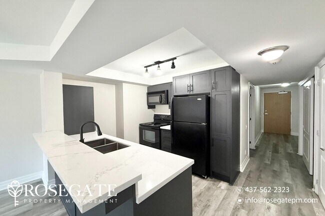 Building Photo - Stylish 1+Den Condo in the Heart of Oshawa...