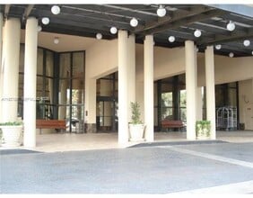 Building Photo - 10185 Collins Ave