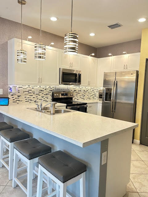 Photo - 2703 Northwest 55th Avenue, Margate, FL 33063 - 3 BR 2.5 BA townhouse