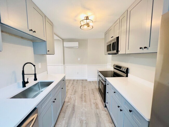 Photo - NEWLY RENOVATED PENTHOUSE UNIT WITH PARKIN...