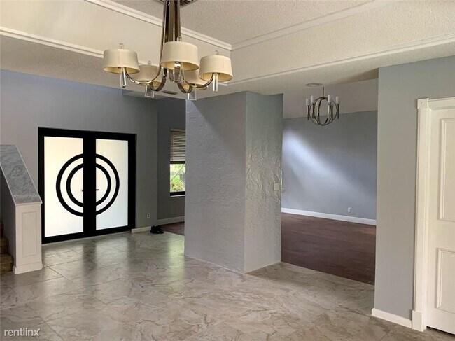 Foto del edificio - 4 br, 2.5 bath House - 10334 NW 6th Ct