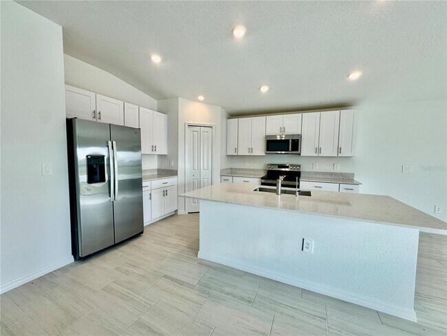 Foto del edificio - 8828 Bay Leaf Dr