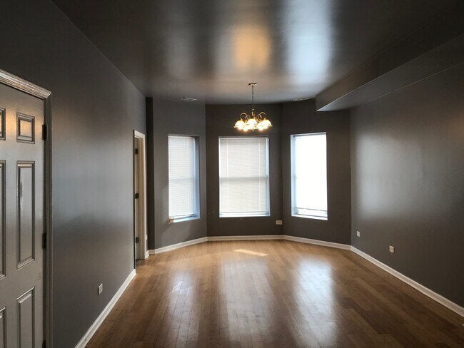 Building Photo - 6438 S Vernon Ave