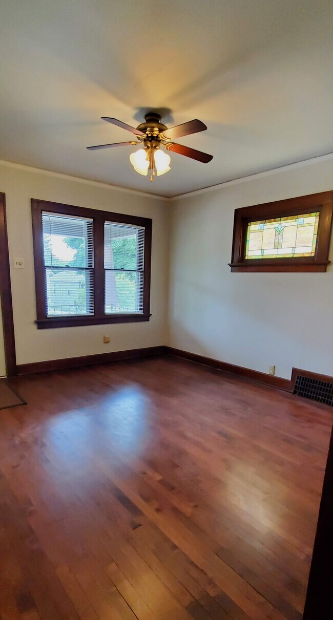 Living Room with original stained glass window.. - 1755 S 71st St