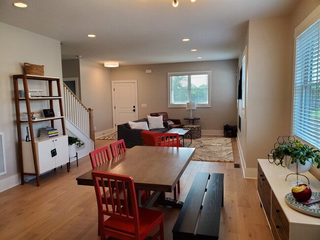 Open floorplan and 9' ceilings make for a spacious living-dining-cooking area. - 1021 Cheatham Pl