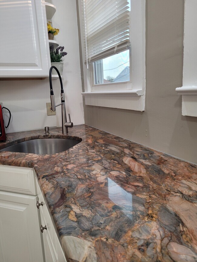 Blue fusion granite - 349 E Riviera Ave